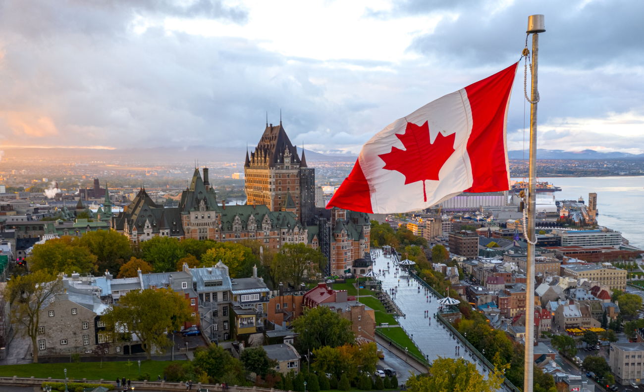 Canadian flag with a person holding a stethoscope